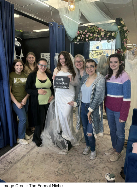 Group of women celebrating find the dream dress at a bridal appointment at The Formal Niche