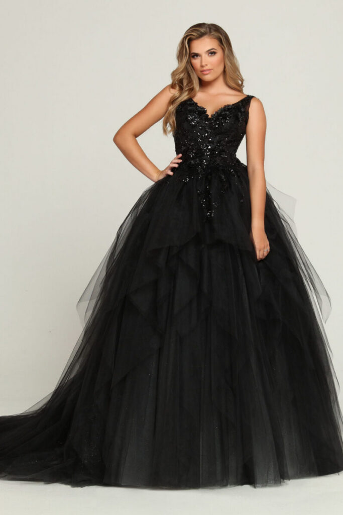 Black alternative wedding dress with a sequined bodice, layered tulle ball gown skirt and dramatic bridal silhouette.